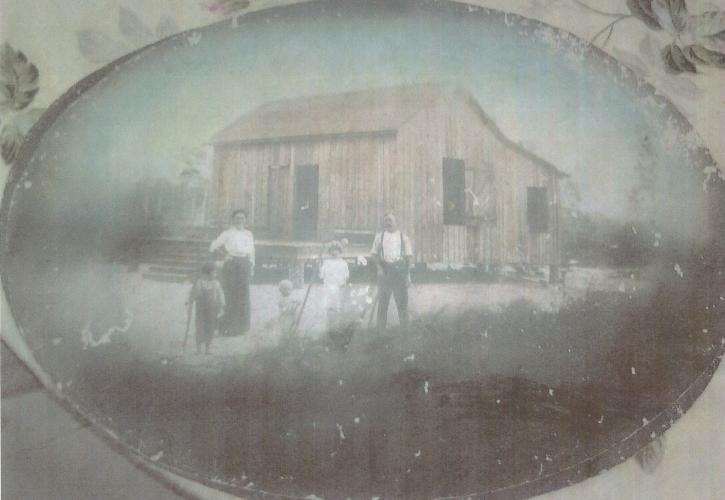 Ethel resident William D. Fillmon and family in front of their home at Ethel - circa 1920s