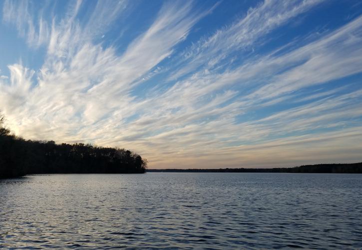 Ribbons of clouds fill the sky at sunset over Lake Talquin.