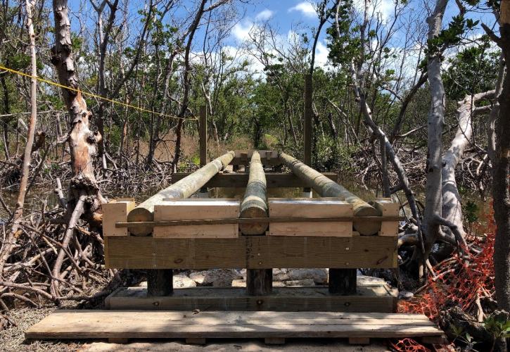 A view of the progress being made to restore the nature trail bridge.