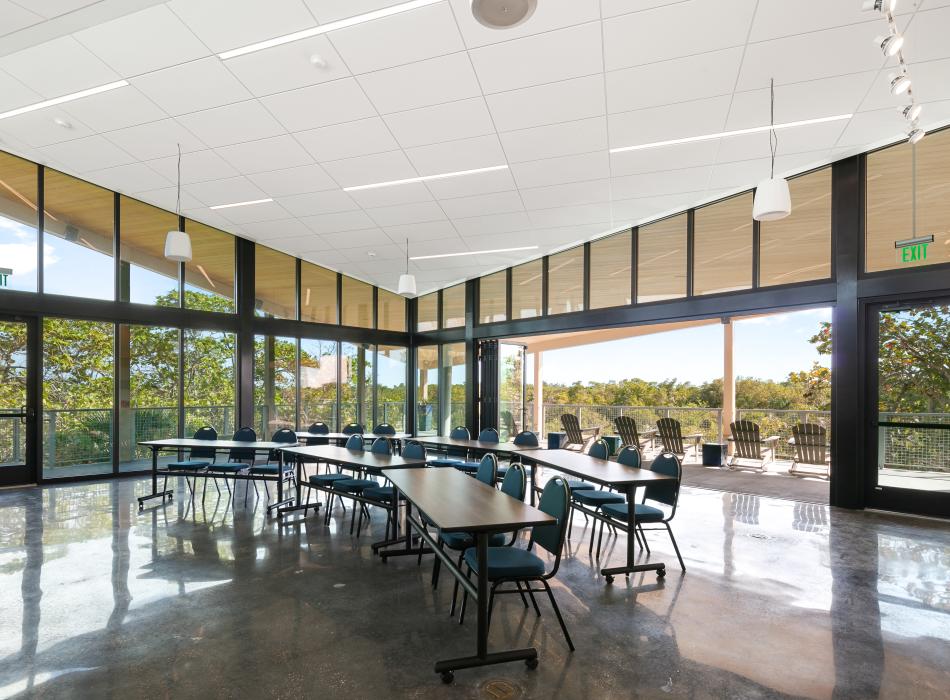 Tables and chairs set up in the multipurpose room.