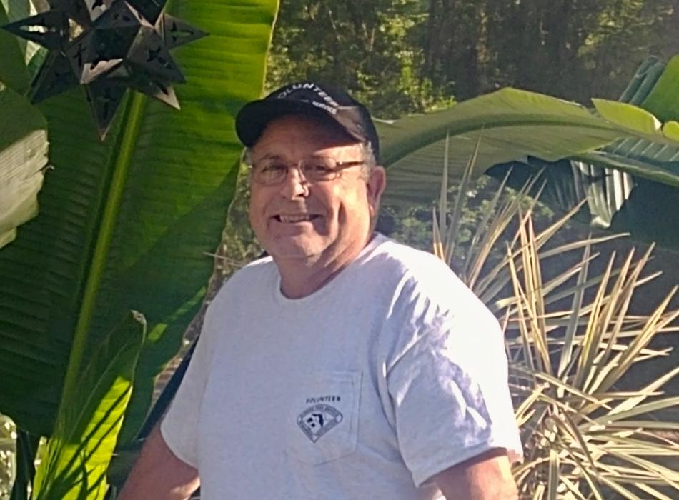 De Leon Springs volunteer Joe Salem smiling for the camera