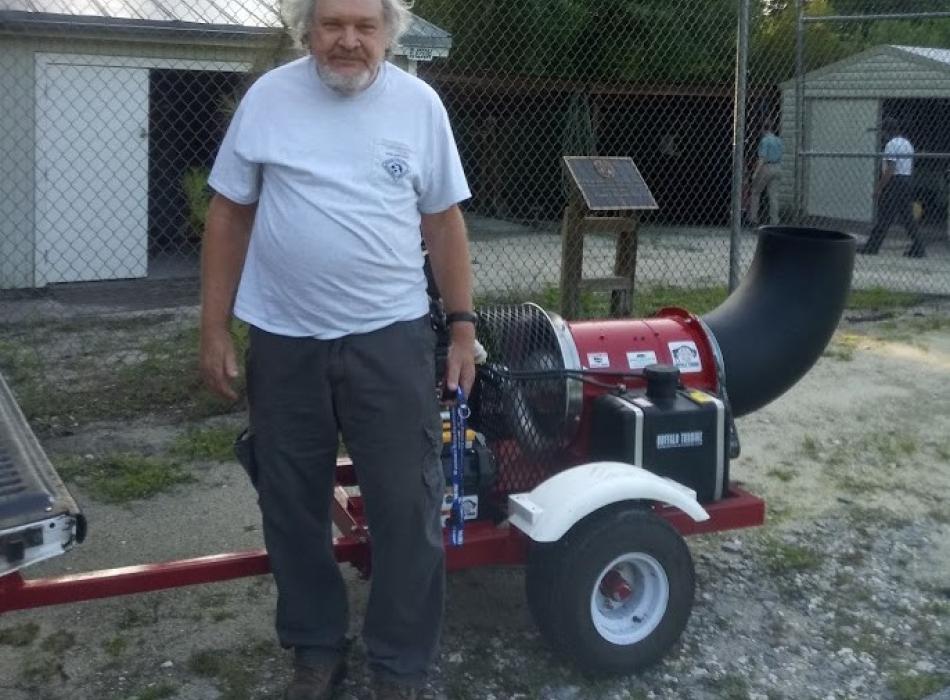 Volunteer Bob Wagner smiling at the camera