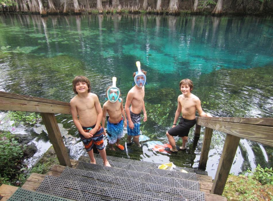 Four boys ready to swim or snorkel at Manatee Springs State Park.