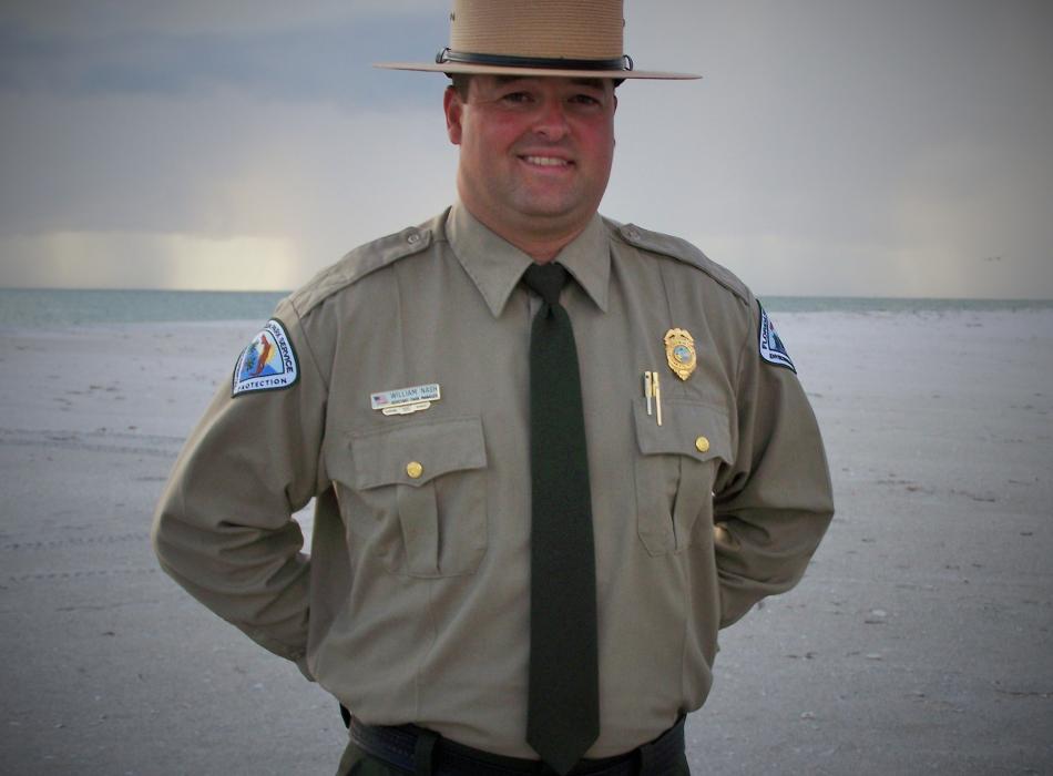 Bill Nash, smiling at the camera, wearing his ranger uniform.