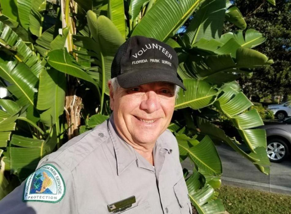 Volunteer Bill Ney smiling at the camera 