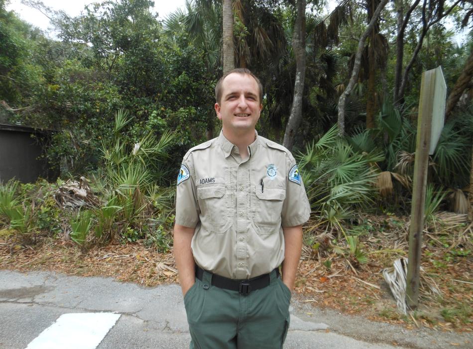 Tomoka Park Ranger Mark Adams smiling at the camera in uniform