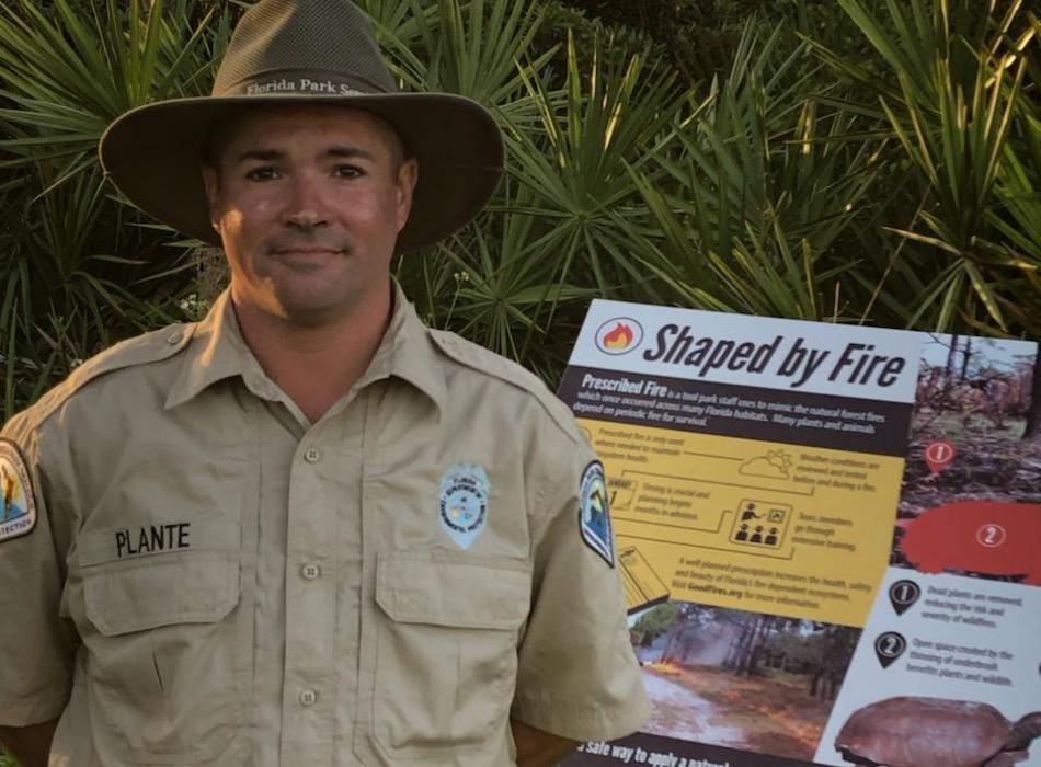 Ranger John Plante smiling in his park uniform