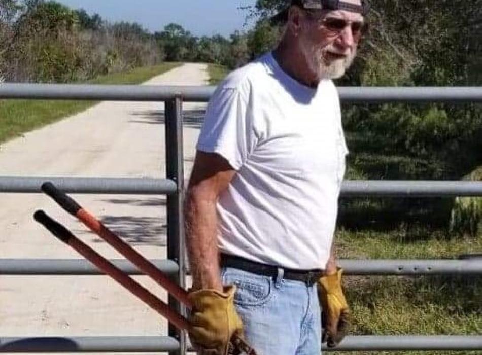 Volunteer Keith holding clippers