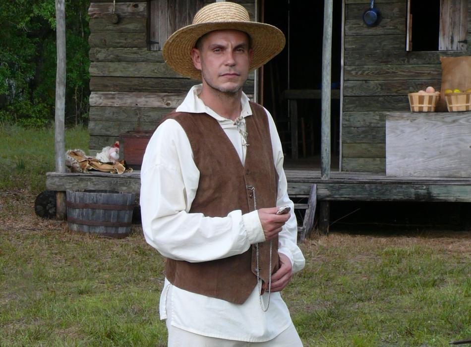 Adam Dunham, dressed in period clothing.