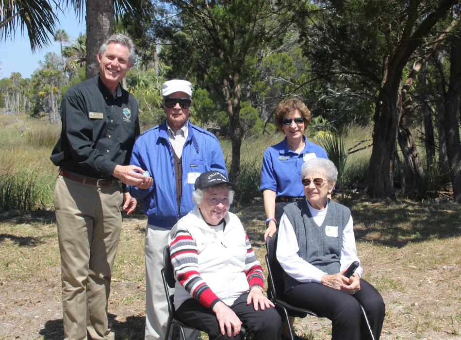 The Rainbow Springs Volunteers, standing in a group, smiling at the camera.