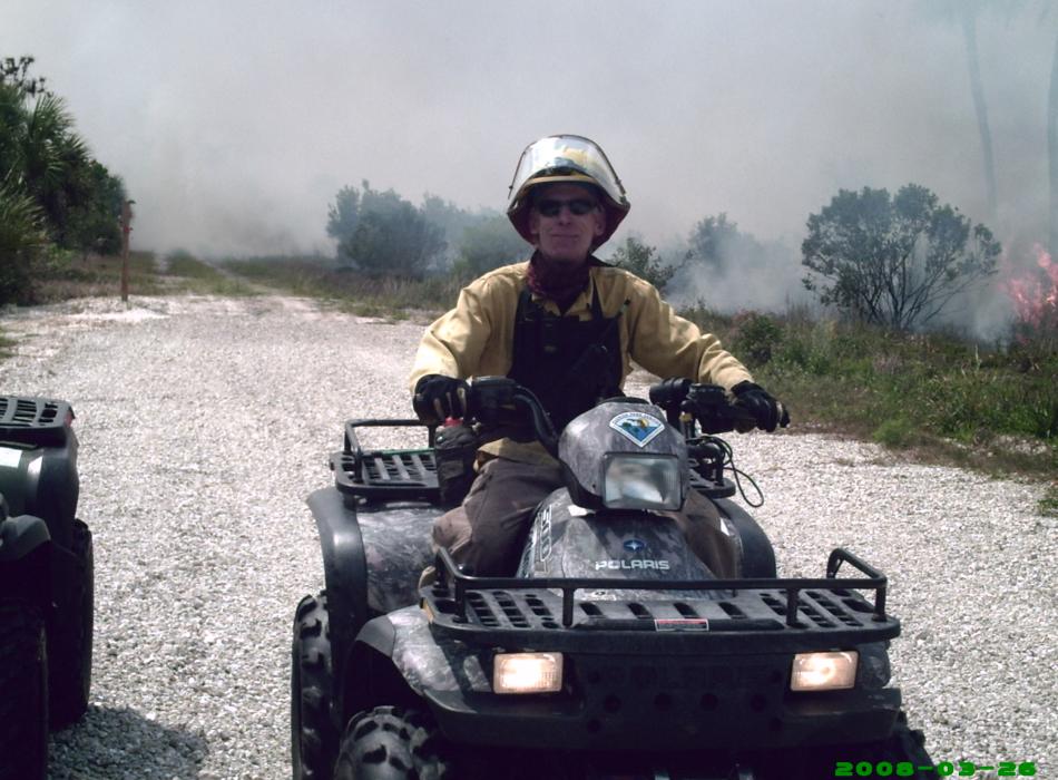 Jay Garner riding a four wheeler.