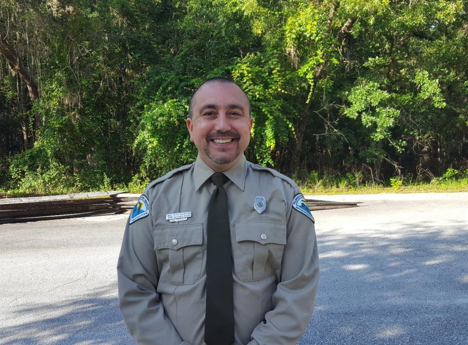 Park Ranger Keith Aliengena smiling at the camera