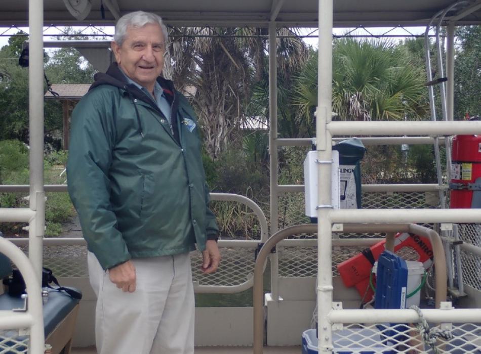 Image of Rick Mainster on the deck of the Monroe tour boat.